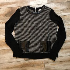 Sweater with leather and zipper accent
